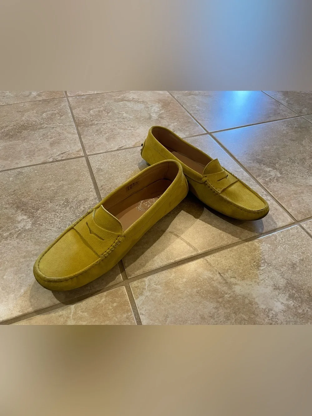 Tod’s Gommino Penny Loafers in Yellow